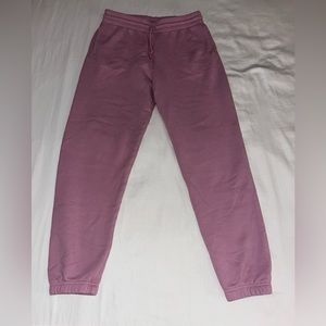 Aritzia TNA Boyfriend Cozy Fleece Sweatpants in Rose color size L (fits like M)